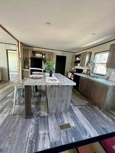 The Promotional Series / The Rosewood FAC28644A — manufactured home photo 1 at Texas Home Outlet in Huffman, TX