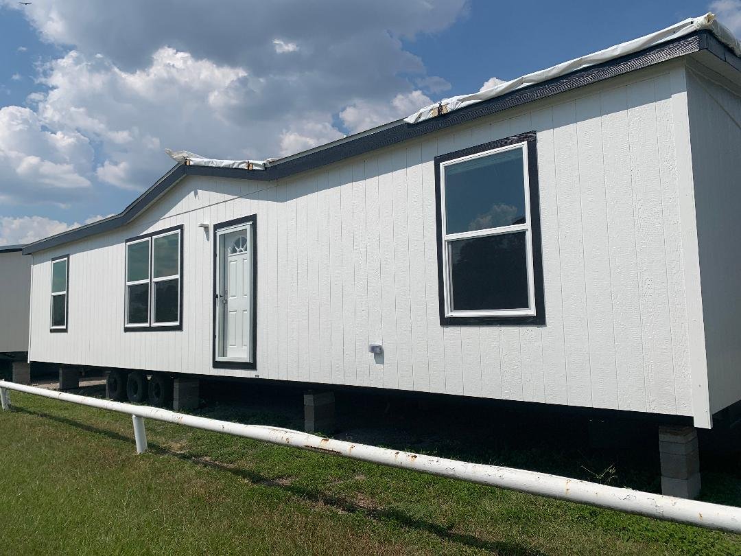 The Promotional Series / The Nassau FAC28483A — manufactured home photo 1 at Texas Home Outlet in Huffman, TX